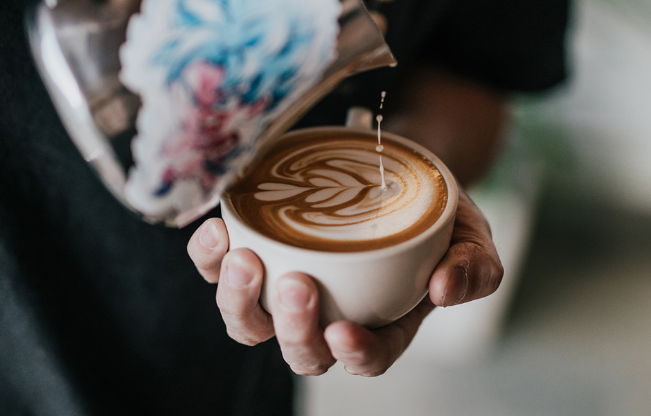 barista performing latte art